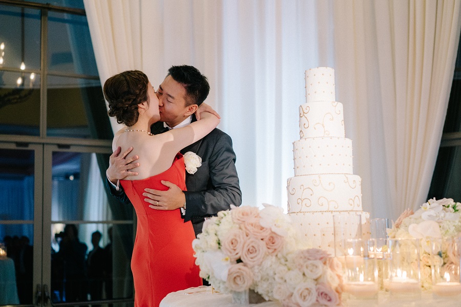 24 Pelican Hill Wedding by Steve Steinhardt Cake cutting