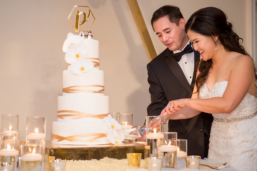 39_Ritz Carlton Laguna Niguel Wedding by KLK Photography_Reception Modern Gold Cake Cutting