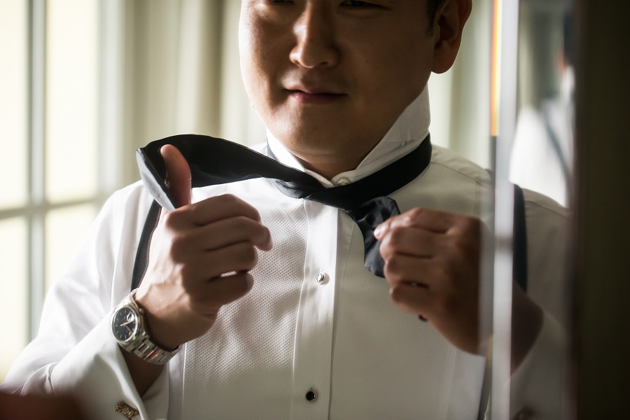 12 Ritz Carlton Laguna Niguel Wedding by DPark Photography Getting Ready Groom Bowtie